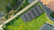 © Syahrul Zidane A - Aerial View of Eco-Friendly Solar Panels on Green Roof Integrated with Urban Landscape Design