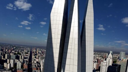 Aufkleber - Sleek skyscraper panorama with modern architecture, glass facade, and cityscape blue sky, featuring sharp modern architecture