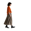 © Songpong - Woman walking in orange shirt and brown skirt isolated on transparent background