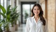 © kaowsar - Confident young asian woman in white shirt