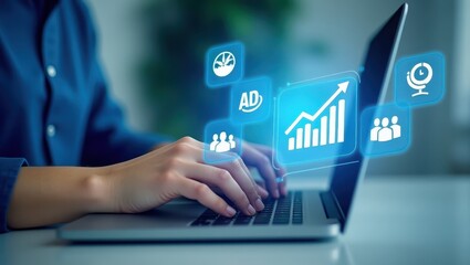 Hands typing on a laptop with digital growth icons displayed.