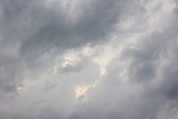 Wall Mural - dark storm clouds on the sky. beautiful gray cloudscape before the rain. scenic environment of disaster climate. threatening evening forecast