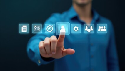 person interacts with a holographic interface displaying various icons.