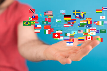 Poster - Image of a hand holding a network of interconnected flags representing global connections and international collaboration.