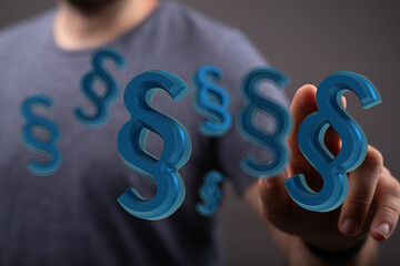 Aufkleber - Abstract image of 3D paragraph symbols floating above a hand, representing legal concepts and digital law.