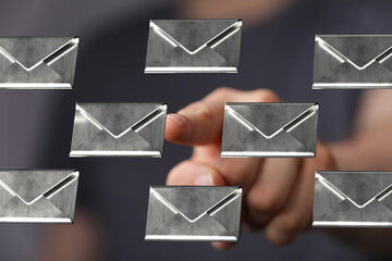 Poster - Hand pointing at digital email icons.  Concept for online communication, inbox management.