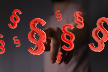 Aufkleber - Abstract image of a hand interacting with floating paragraph symbols, perfect for legal or digital concepts.