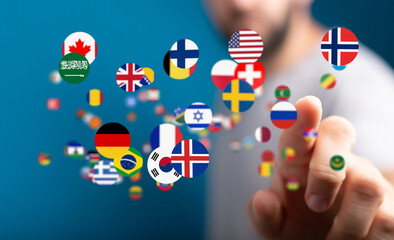 Poster - Image of a person interacting with floating flags, representing global communication and international business.