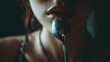 © Justlight - Close up of a woman holding a spoon between her lips, her face partially reflected in the spoon's bowl, creating a mysterious and intriguing atmosphere