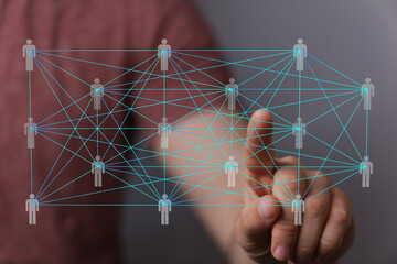Poster - Hand interacting with a digital network of interconnected people, representing global communication and collaboration.