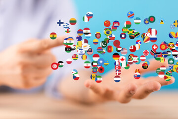 Aufkleber - Image of hands holding many flags, symbolizing global unity and international connections.