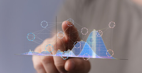 Poster - A finger interacts with a holographic graph, showcasing data analysis and modern technology.