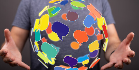 Leinwandbilder - Image of person holding colorful speech bubbles, representing global communication and social media.