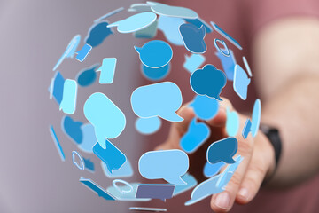 Poster - Abstract image depicting a sphere of interconnected speech bubbles, symbolizing global communication and networking.