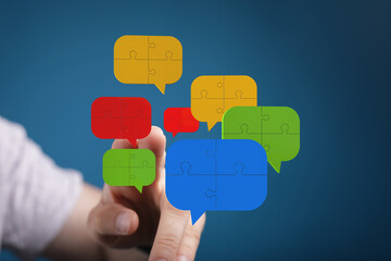 Aufkleber - Abstract image of puzzle pieces forming speech bubbles, symbolizing communication and collaboration.