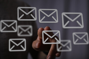 Poster - Hand interacting with email icons, representing digital communication and inbox management.