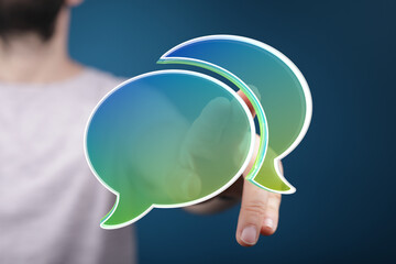 Aufkleber - Abstract image of a person interacting with digital speech bubbles, representing communication.