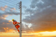 © RooM The Agency - Electrician talking on a walkie-talkie working on high-voltage electricity poles, Thailand