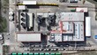 © Aerial Drone Master - Production, factory with its own access railroad track, view from the top. Plant from altitude, vertical downward, from a drone