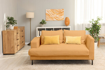Aufkleber - Stylish living room with comfortable sofa and light grey wall. Interior design