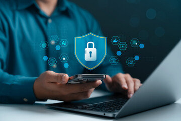 Wall Mural - concept of digital security, businessman using smartphone and laptop with cybersecurity icons, data 