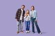 © Pixel-Shot - Happy family in stylish denim clothes on purple background