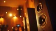 © HPMP Studio - Viewing Audio Speakers in a Dimly Lit Room with Warm Lighting