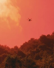 Poster - Remote sensing drone flying over dense forest canopy under a red sky, showcasing aerial technology for sustainable forestry and environmental monitoring