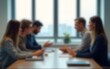 © zhao - blur background of an office meeting with a working group of business people. High quality