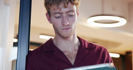 Poster - Creative man, tablet and reading feedback in office with scroll, contact or check notification for night deadline. Person, tech and app with overtime, project planning or review at startup agency