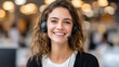 © Наталія Євтехова - Cheerful woman working in a call center with headset and computers