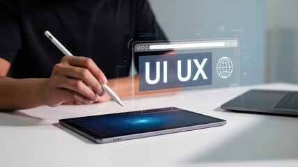 Person interacting with a digital tablet displaying UI/UX interface elements.