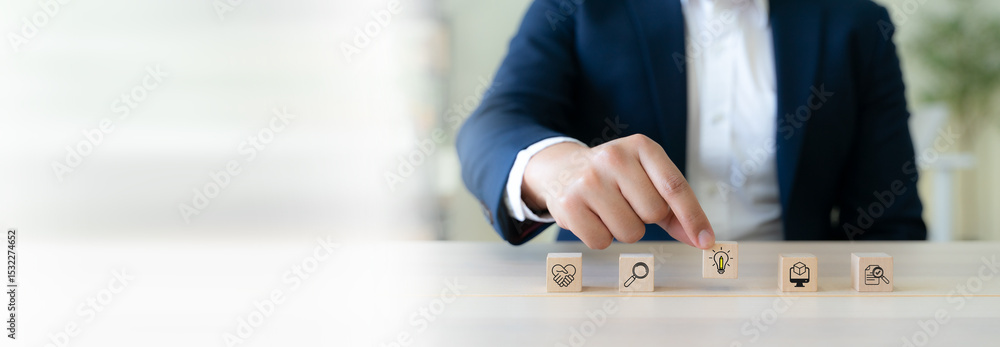 Design Thinking Process concept. Wooden blocks with icons; the key ...