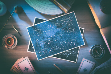 Wall Mural - Astrological background of study and forecast with maps on table
