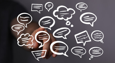 Aufkleber - Abstract image of hand interacting with speech bubbles, symbolizing communication, dialogue, and ideas.