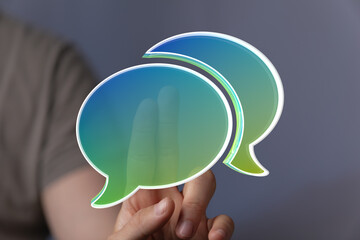 Aufkleber - Abstract image of two speech bubbles, representing communication and dialogue.