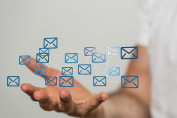 Poster - Hand holding network of email icons.  Digital communication, global network, connection concept.