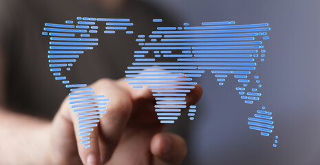 Aufkleber - Hand interacting with a digital world map, representing global connectivity and networking.