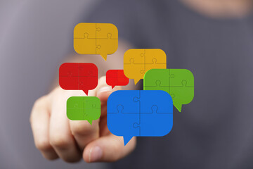 Poster - Abstract image of puzzle pieces forming speech bubbles, symbolizing communication and collaboration.