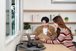 © itchaznong - Collaborative Learning Environment. Two students discussing project ideas in modern workspace.