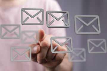 Poster - Hand interacting with digital email icons,modern communication concept.