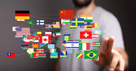 Aufkleber - Image of a man interacting with a digital network of flags representing global connections and collaboration.
