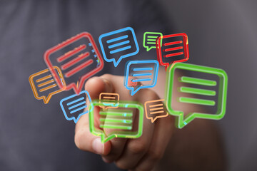 Aufkleber - Hand interacts with digital chat bubbles, symbolizing communication and online messaging.