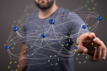 Aufkleber - Man interacting with a digital network, representing global connections and technology.