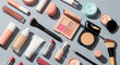 © Ryan - A stylish makeup kit featuring an eyeshadow palette, brushes, beauty blenders, red lipsticks, compact powders, and loose powder for a complete beauty routine.
