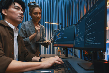 serious of it developers discussing intelligent website development coder system running data online