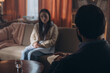 © sashafolly - Man psychotherapist engages in conversation with woman during session