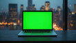 © miss irine - Laptop with green screen on wooden desk with city skyline blurred background at twilight. Technology business concept. Empty space for graphic, text. Display mockup for website design, presentation.