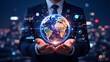© Nur - Businessman holding the digital globe illustrating global network connectivity and data analysis