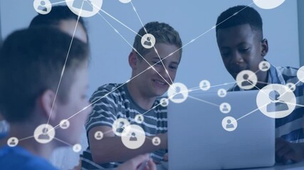 four classmates typing on laptop in study room, building education network overlay with user icons